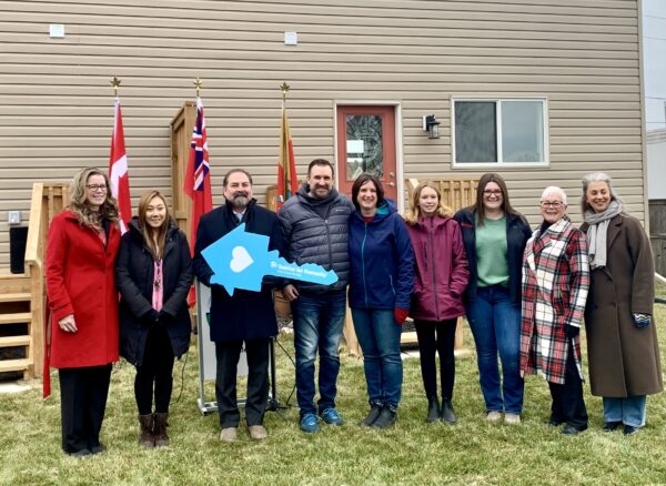Families receiving keys to their new homes